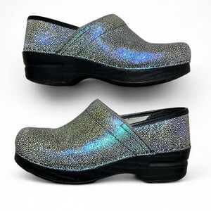 Dansko Iridescent Sparkle Clogs in white with purple-blue color shift